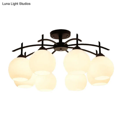 Opal Glass Black Chandelier with frosted globes on curved black arms on Tampa Home & Garden Store