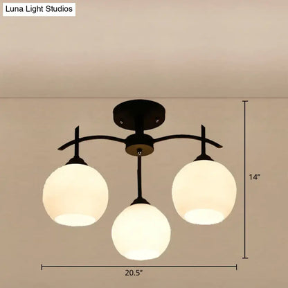 Opal Glass Black Chandelier by Decorbites; black metal frame with three frosted glass globes on Tampa Home & Garden Store