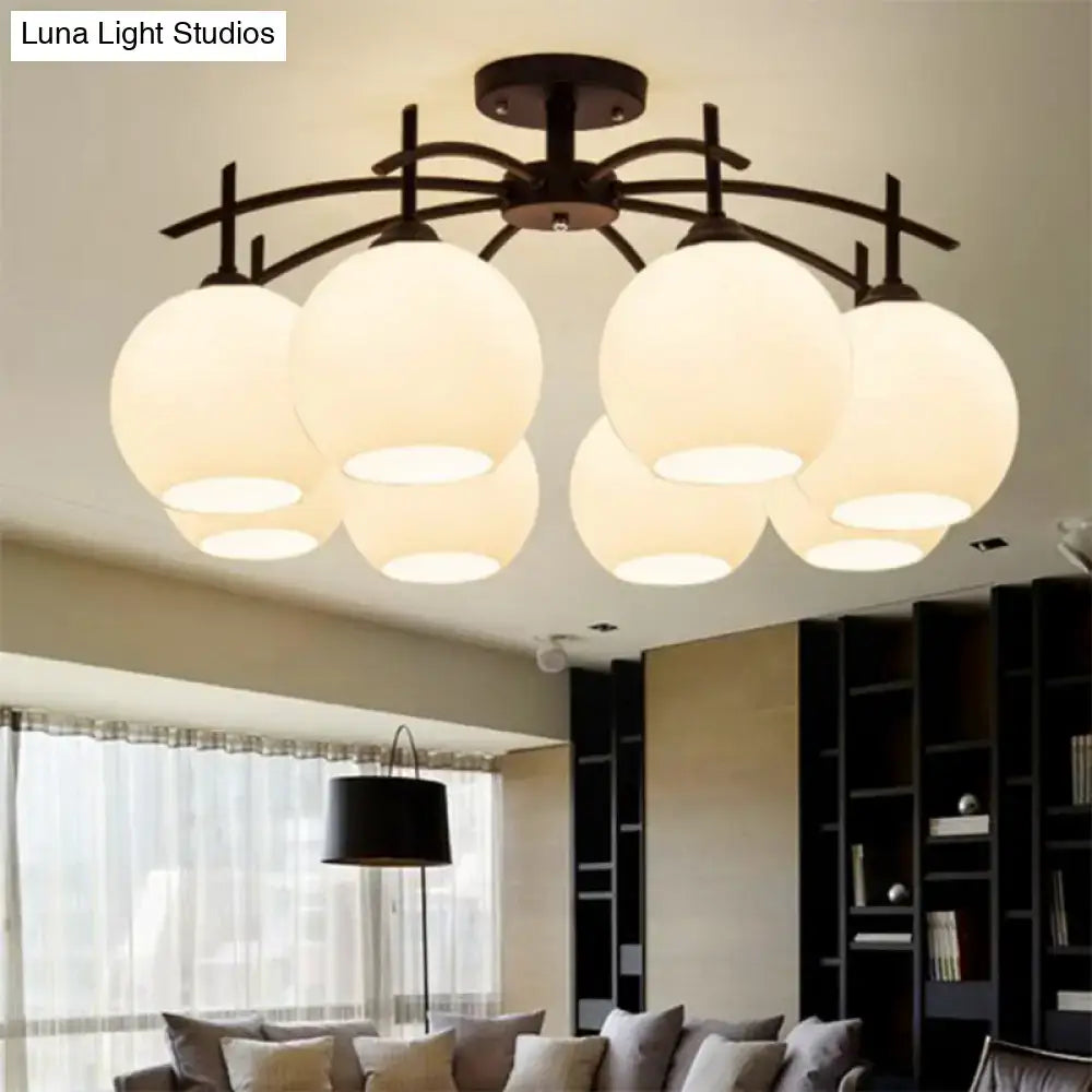 Opal Glass Black Chandelier by Decorbites with eight glass globes and dark metal frame on Tampa Home & Garden Store
