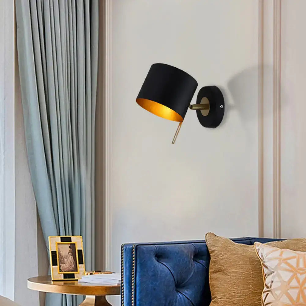 Pink Brass Cylinder Sconce with black shade and gold interior, wall-mounted lighting on Tampa Home & Garden Store