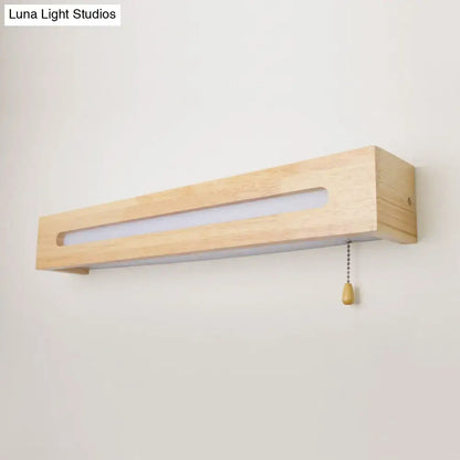 Wood wall sconce light in natural pine with long frame and frosted insert, pull chain on Tampa Home & Garden Store