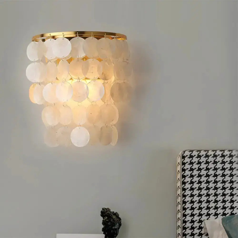 Minimalist shell-white waterfall light fixture sconce with hanging shells by Decorbites on Tampa Home & Garden Store