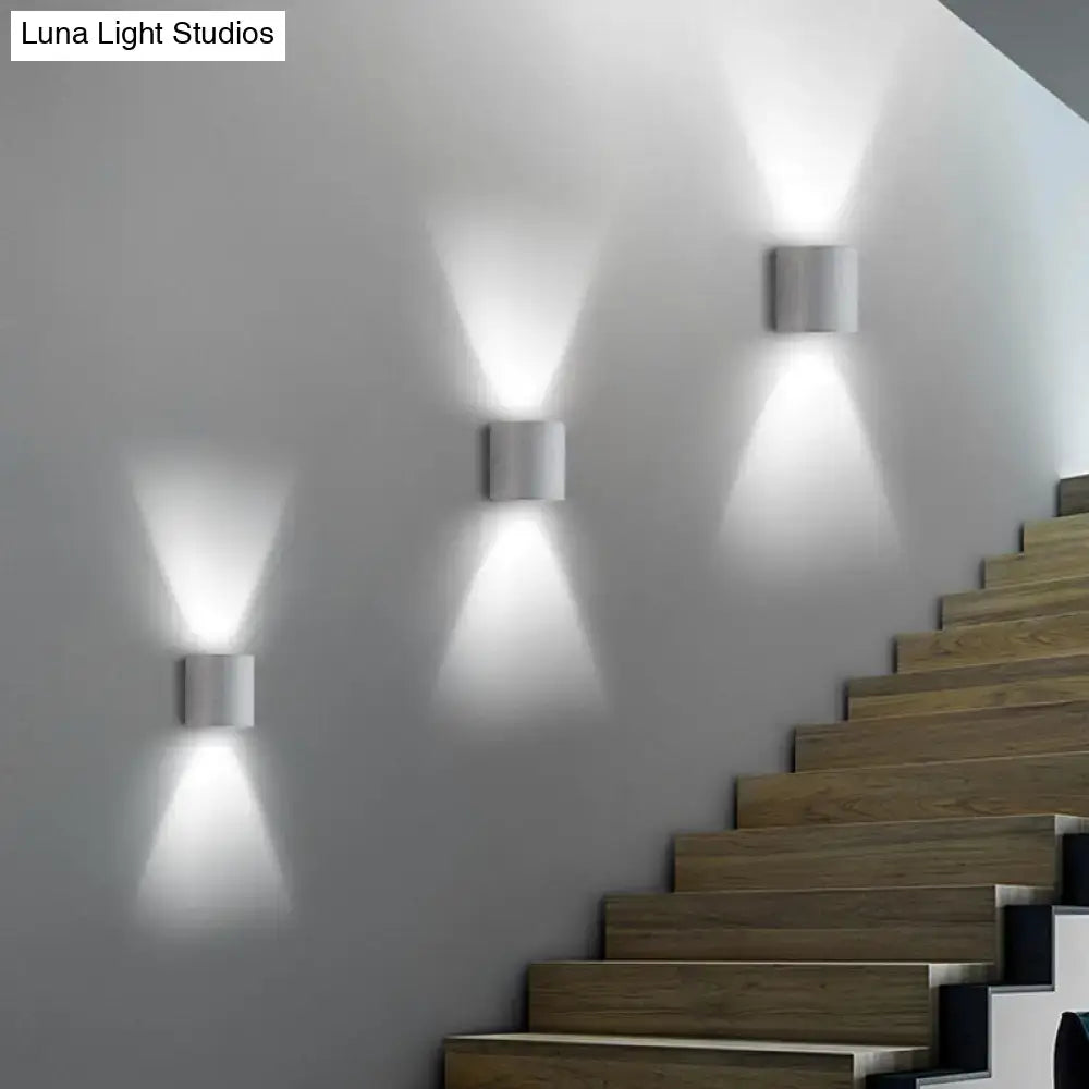 Speckled Concrete Wall Light by Decorbites; three modern wall sconces lighting a staircase on Tampa Home & Garden Store