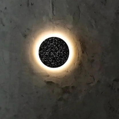 Minimalist terrazzo round LED wall sconce with black speckled and warm halo Decorbites on Tampa Home & Garden Store