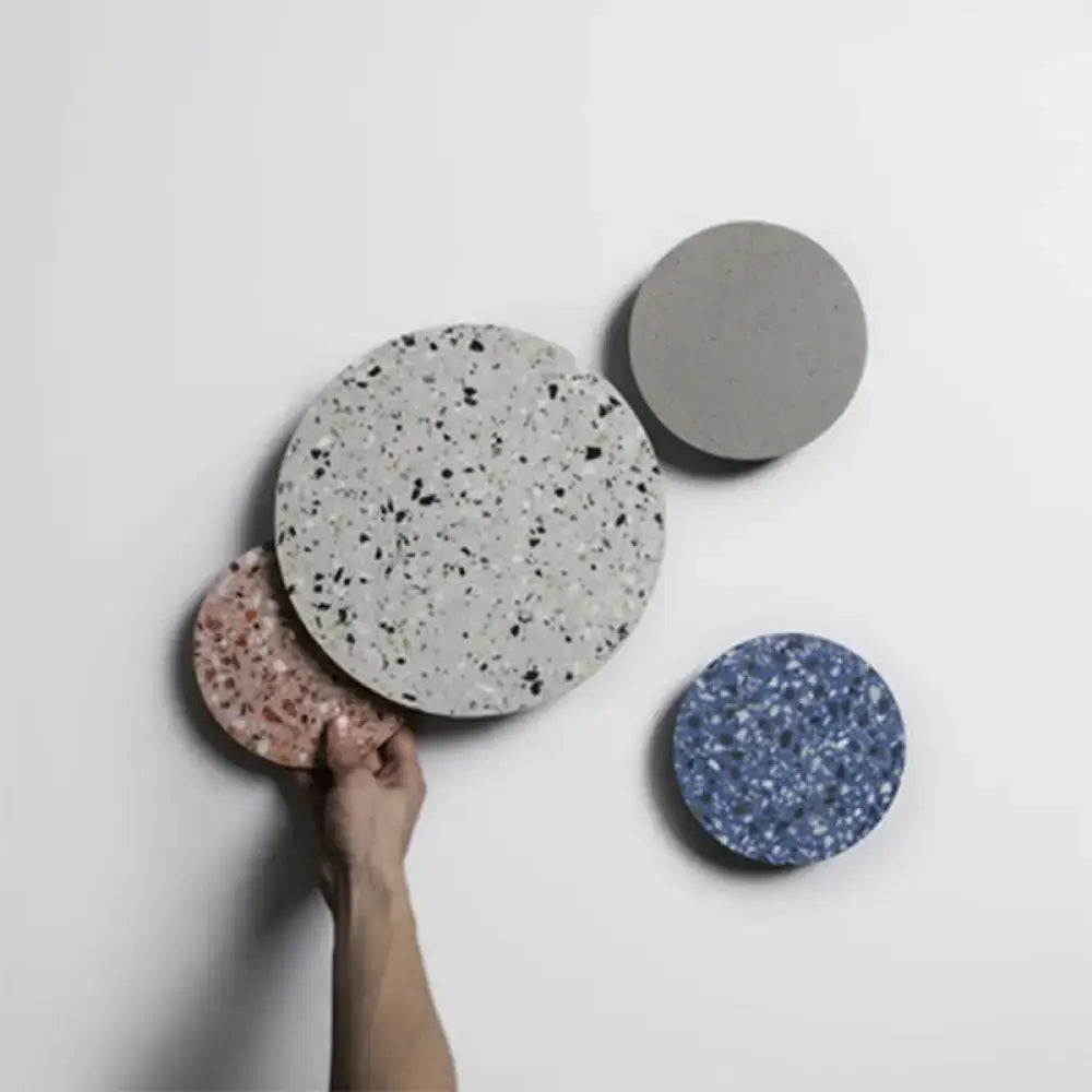 Minimalist terrazzo round LED wall sconce by Decorbites; multicolor terrazzo discs on wall on Tampa Home & Garden Store