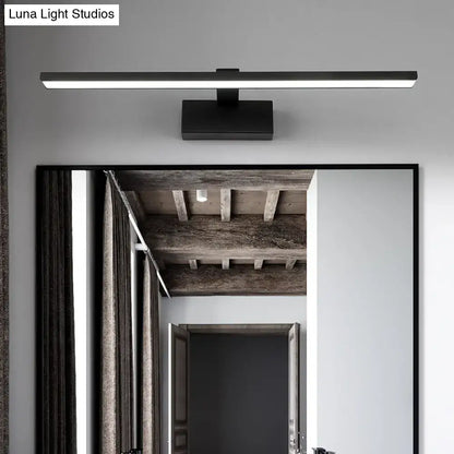 White acrylic vanity light by Decorbites, slim horizontal LED bar above a large bathroom mirror on Tampa Home & Garden Store