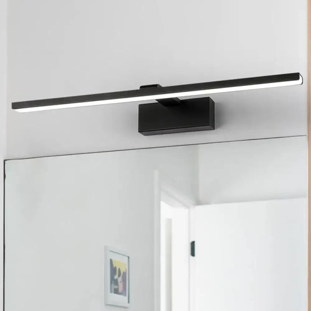White acrylic vanity light bar with black mount above a bathroom mirror Decorbites on Tampa Home & Garden Store