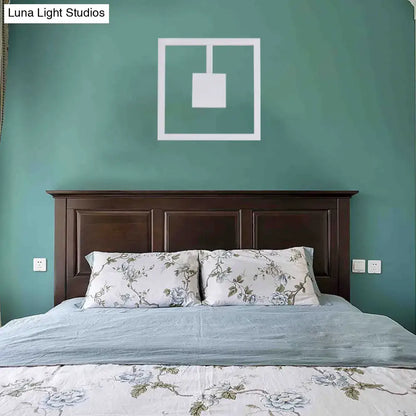 White Acrylic Dual-Voltage Metal Wall Light by Decorbites with square pendant on teal wall on Tampa Home & Garden Store