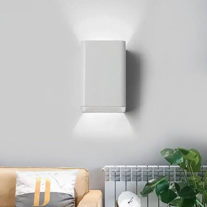 White cube wall lamp casts up and down light; wall-mounted metal fixture by Decorbites on Tampa Home & Garden Store