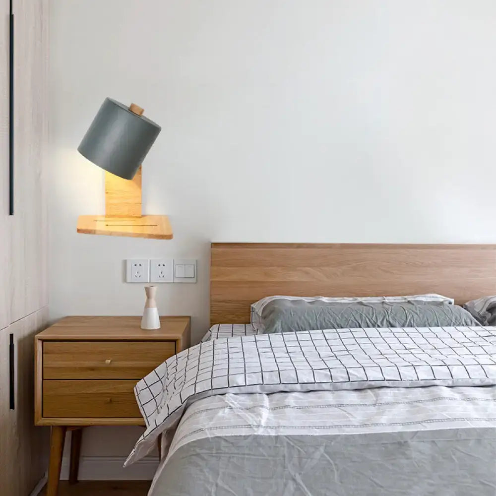 Green Nordic Wall Sconce by Decorbites, wooden mount with gray shade in a bedroom on Tampa Home & Garden Store