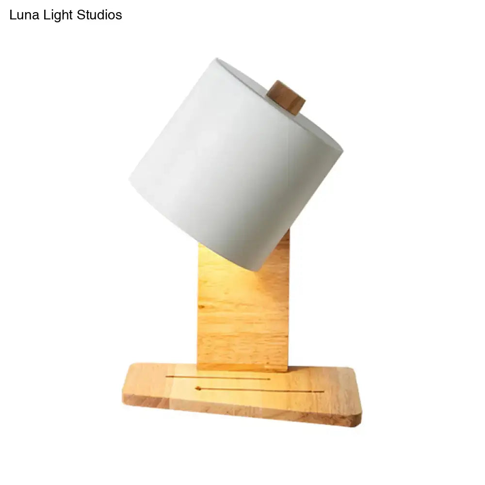 Green Nordic Wall Sconce by Decorbites with a wooden base and angled gray-green shade on Tampa Home & Garden Store