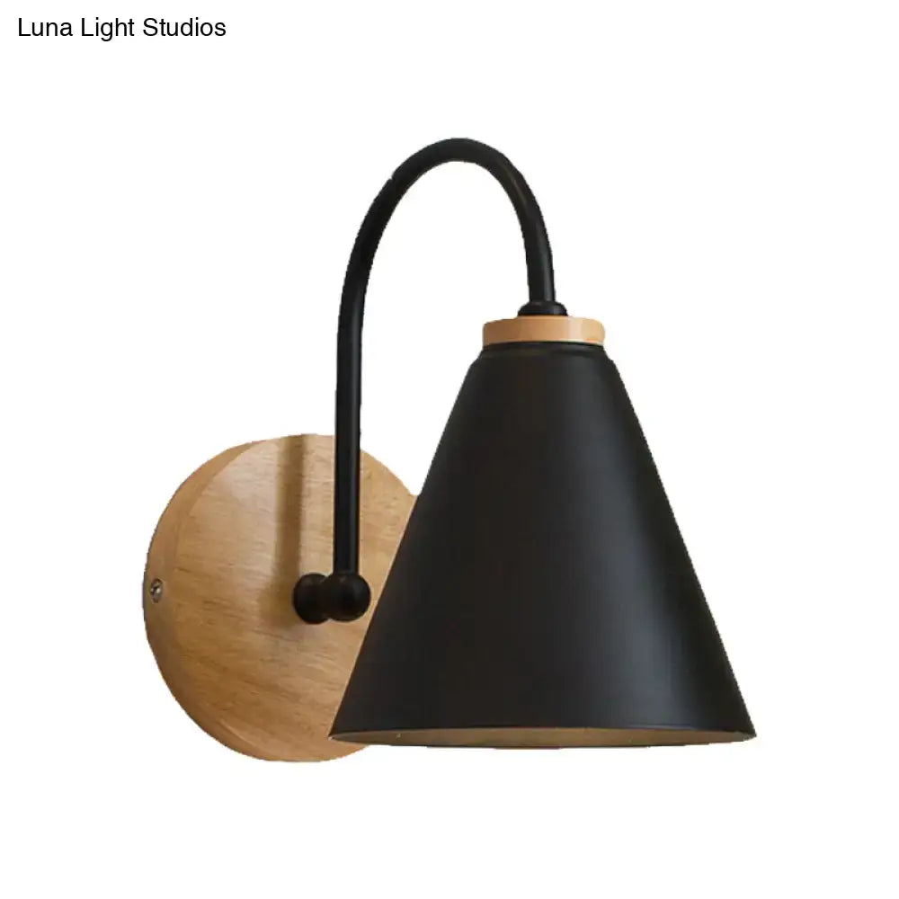 Black metal conical gooseneck wall sconce with wooden backplate on Tampa Home & Garden Store