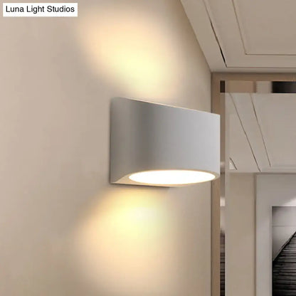 White cylindrical gypsum wall sconce Decorbites, wall-mounted with warm glow on Tampa Home & Garden Store