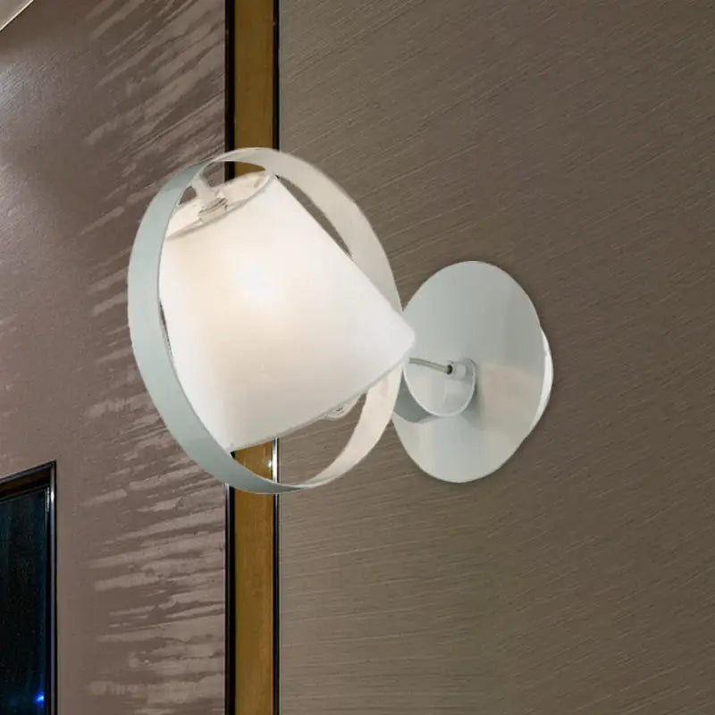 White fabric wall sconce with circular metal ring design and round backplate on Tampa Home & Garden Store