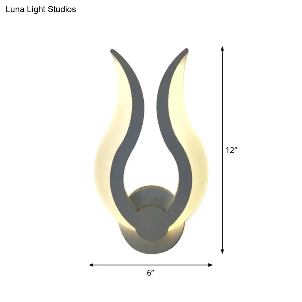 White acrylic flame sconce with dual curved arms, warm glow, wall mount 12in tall 6in wide on Tampa Home & Garden Store