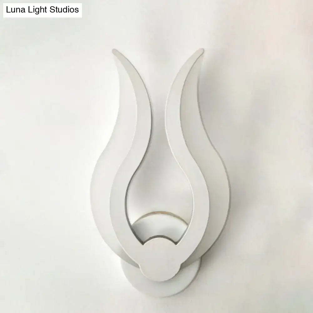 White acrylic flame sconce by Decorbites, wall-mounted sculptural flame with layered curves on Tampa Home & Garden Store