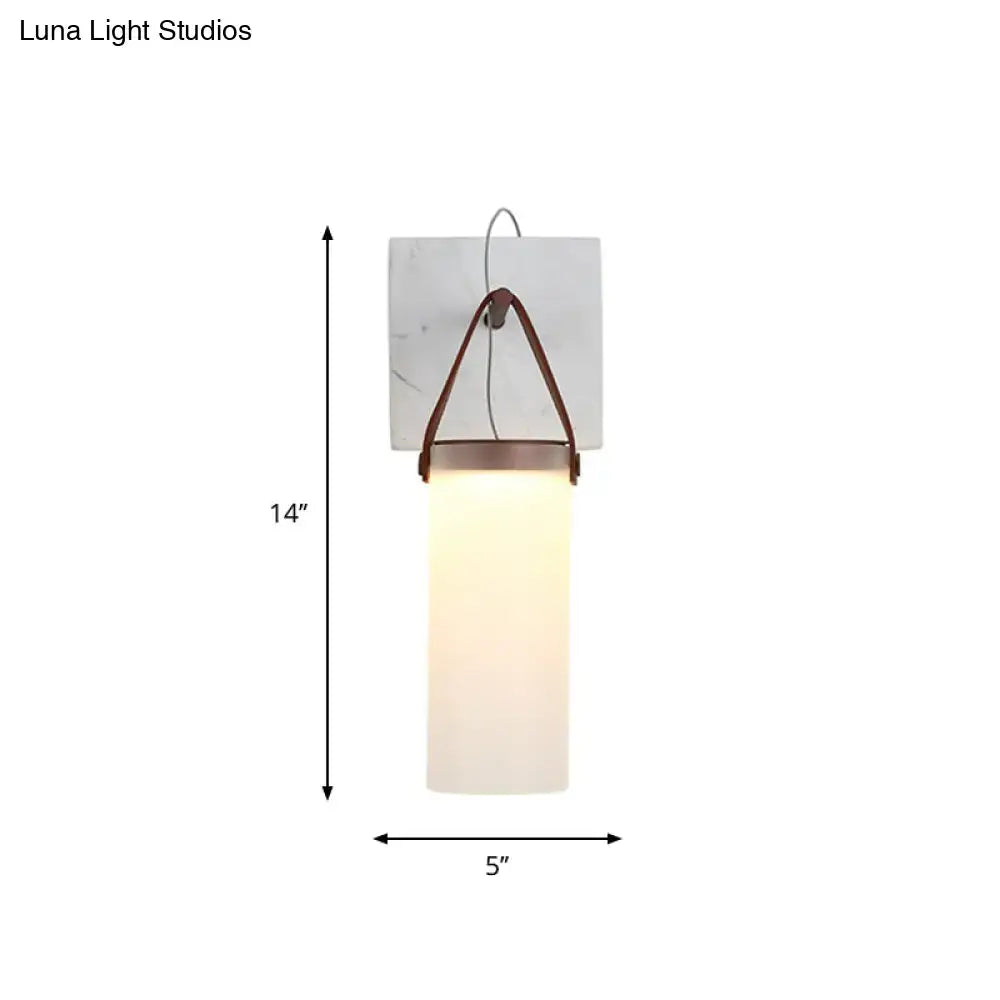 White leather wall light by Decorbites with frosted glass shade and brown leather strap on Tampa Home & Garden Store