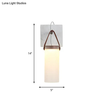 White leather wall light by Decorbites with frosted glass shade and brown leather strap on Tampa Home & Garden Store