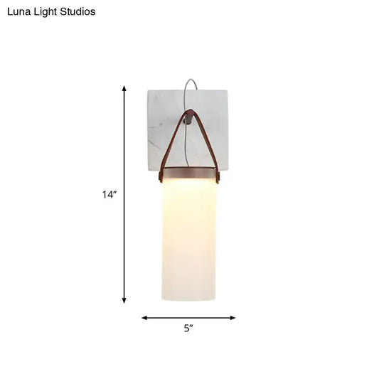 White leather wall light by Decorbites with frosted glass shade and brown leather strap on Tampa Home & Garden Store