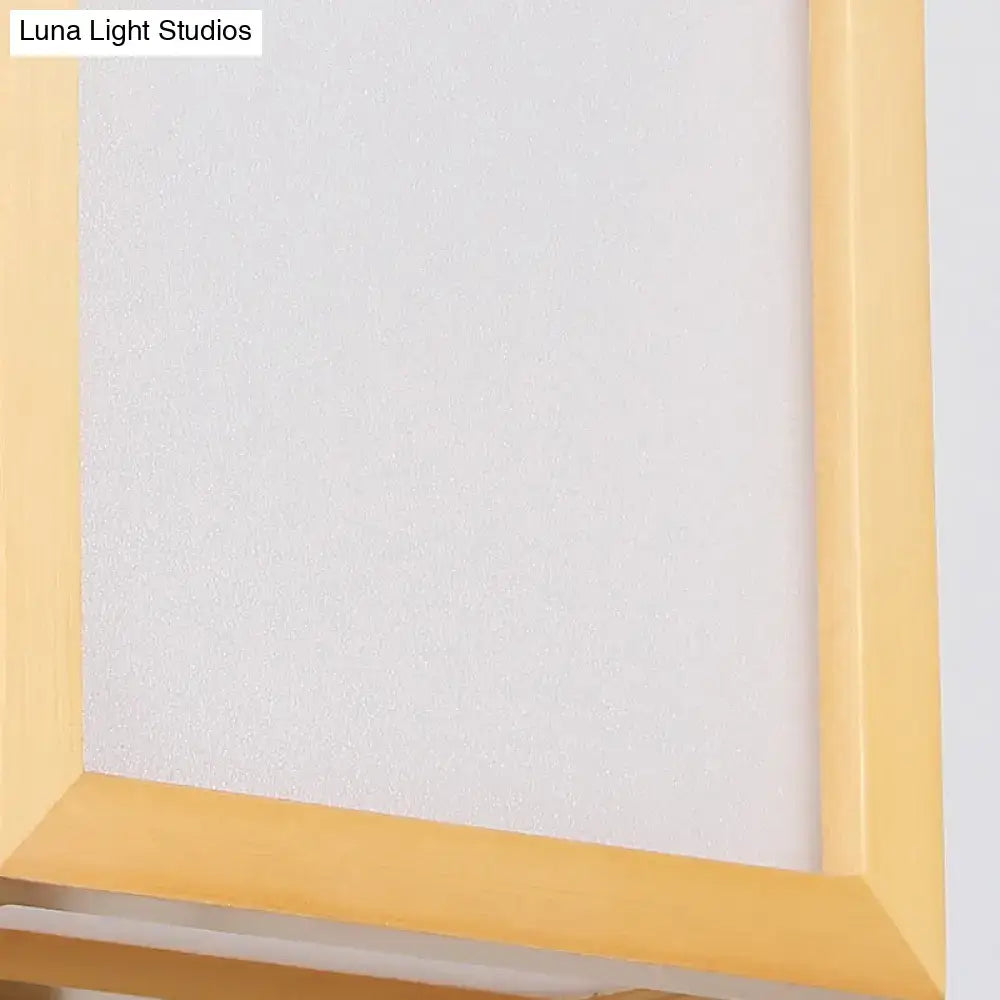 White glass wall sconce by Decorbites with natural wood frame on Tampa Home & Garden Store