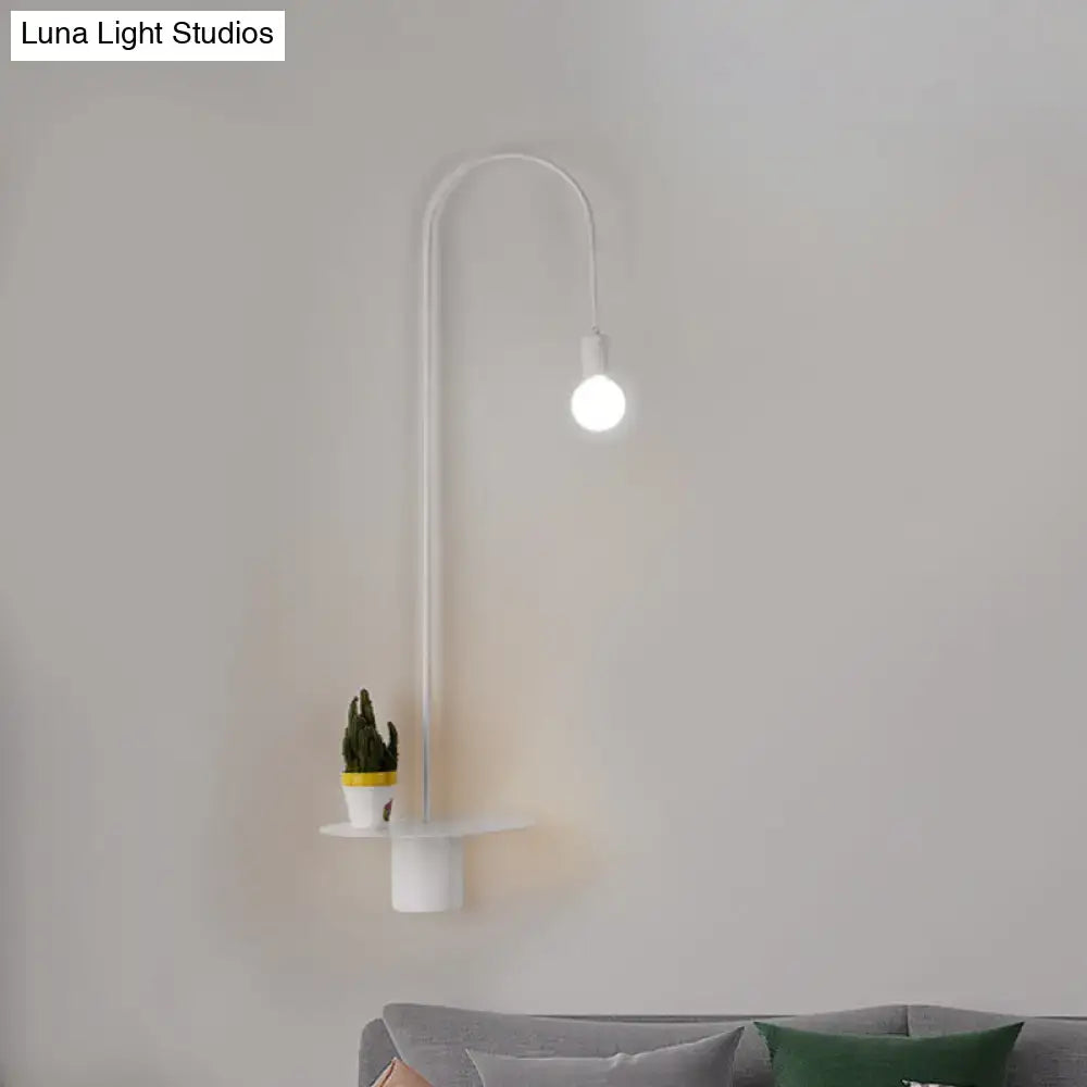 White Gooseneck Wall Sconce by Decorbites with curved arm and shelf with potted plant on Tampa Home & Garden Store