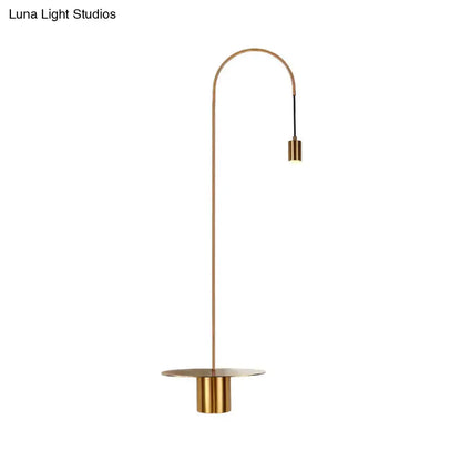 White gooseneck wall sconce by Decorbites with brass curved arm and exposed bulb on Tampa Home & Garden Store