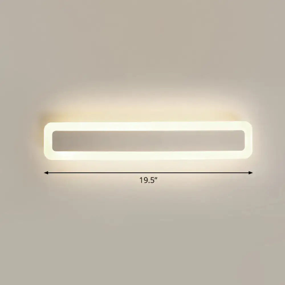 Minimalist white LED vanity light wall sconce by Decorbites, 19.5-inch long, rectangular frame with rounded edges and glowing outer border on Tampa Home & Garden Store