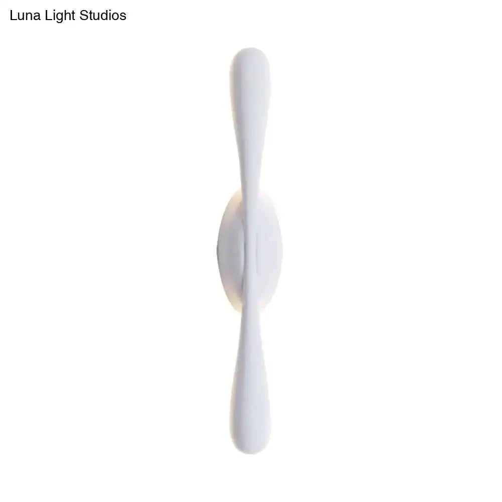 Decorbites white minimalist linear wall sconce with twin tapered ends on Tampa Home & Garden Store