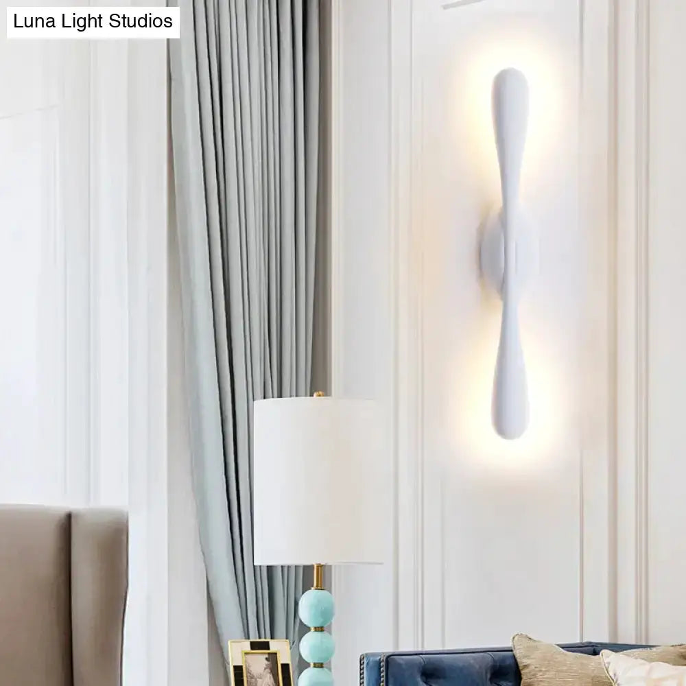 Minimalist white linear wall sconce for living room by Decorbites with vertical LED glow on Tampa Home & Garden Store