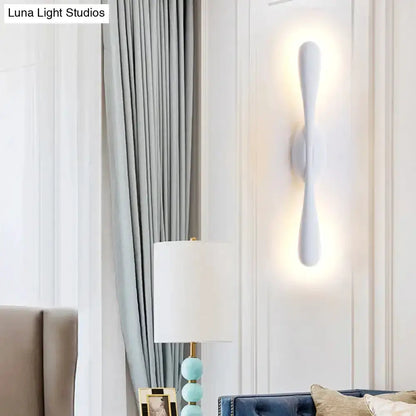 Minimalist white linear wall sconce for living room by Decorbites with vertical LED glow on Tampa Home & Garden Store