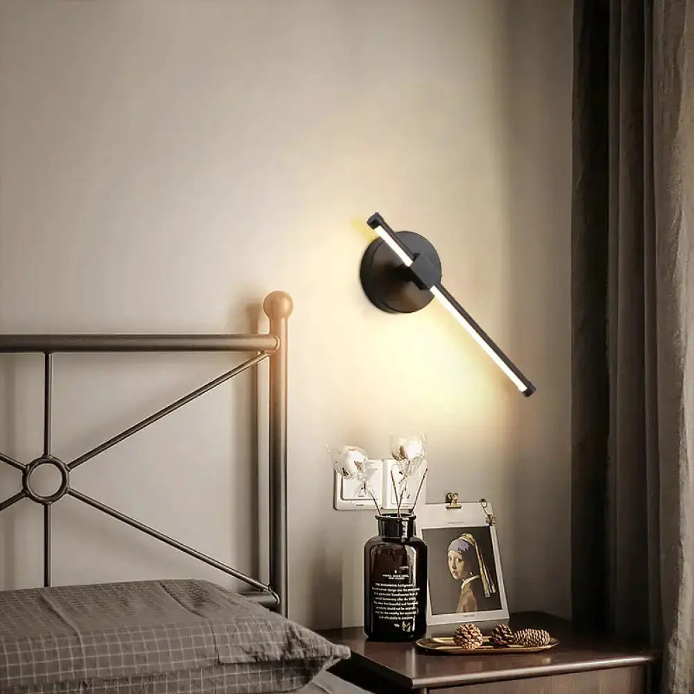 Minimalist white metallic LED wall sconce with diagonal bar for bedroom lighting on Tampa Home & Garden Store