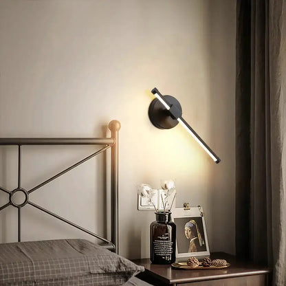 Minimalist white metallic LED wall sconce with diagonal bar for bedroom lighting on Tampa Home & Garden Store