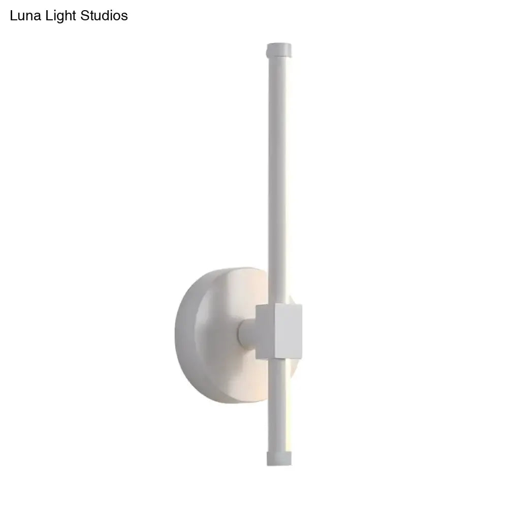 Minimalist white metal LED wall sconce with vertical bar and round backplate Decorbites on Tampa Home & Garden Store