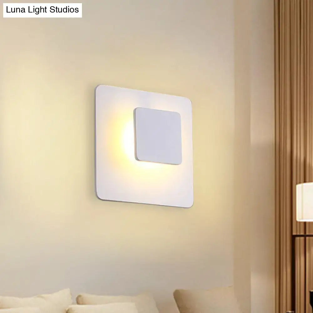 White square LED sconce by Decorbites, wall-mounted with a smaller inner panel, warm glow on Tampa Home & Garden Store