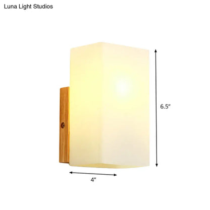 Opal glass wall sconce with wooden backplate by Decorbites, 6.5in tall x 4in wide on Tampa Home & Garden Store