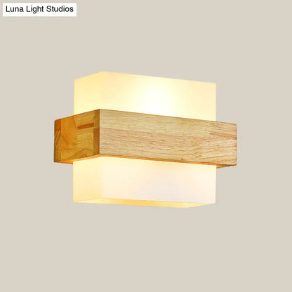 Opal Glass Wall Sconce by Decorbites with natural wood crossbar, warm ambient glow on Tampa Home & Garden Store