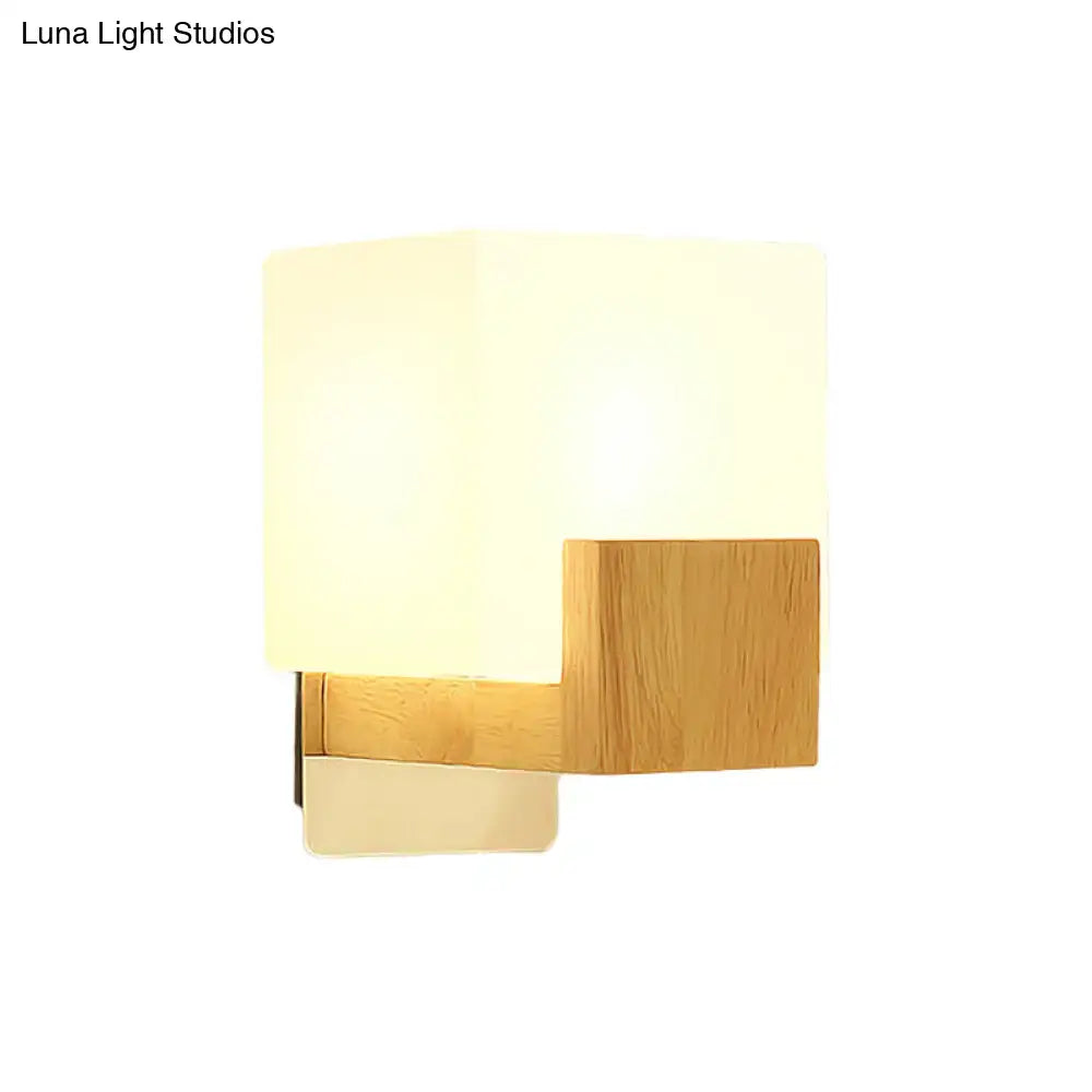 Opal glass wall sconce with warm white shade and natural oak wood arm by Decorbites on Tampa Home & Garden Store