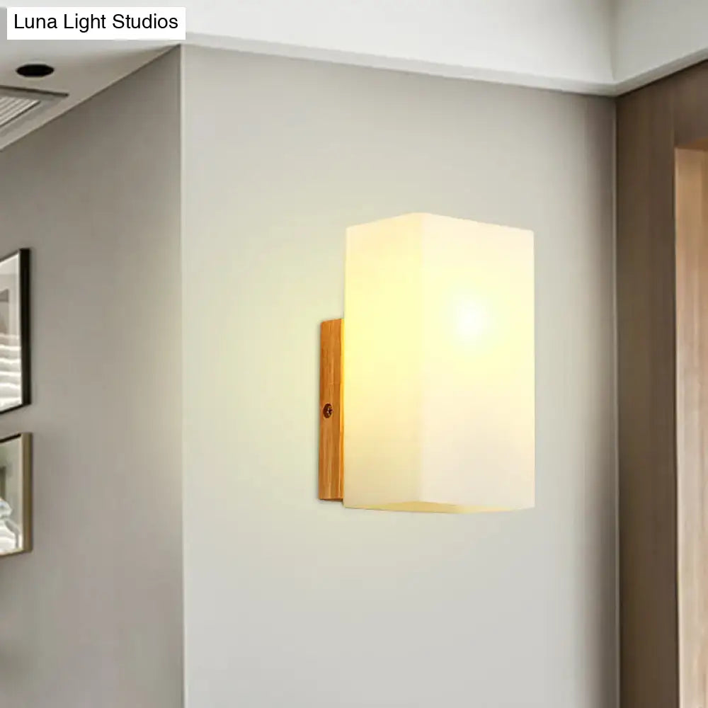 Opal Glass Wall Sconce by Decorbites, wall-mounted with warm white shade and wood backplate on Tampa Home & Garden Store