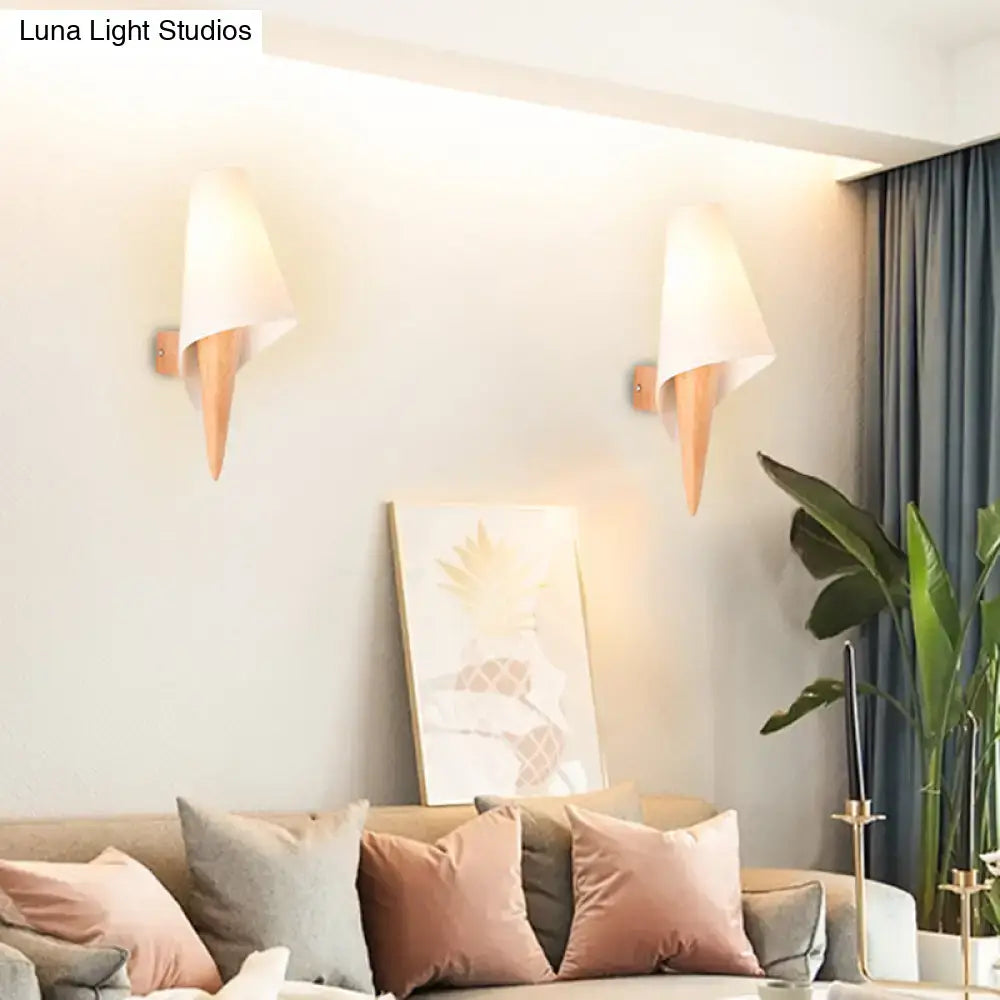 White glass wall light with cone shade and wood accent, pair shown on living room wall on Tampa Home & Garden Store