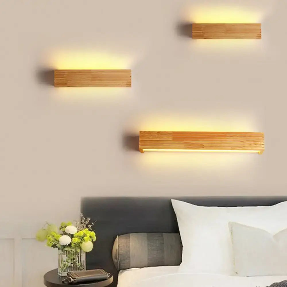 Decorbites Wood Acrylic Shade Wall Sconce set of three natural wood fixtures with warm glow on Tampa Home & Garden Store