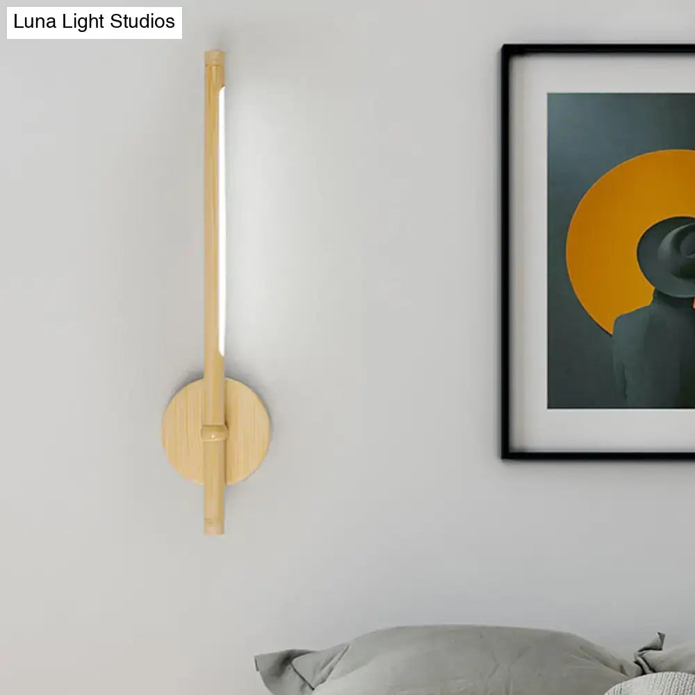 Yellow bamboo wall sconce with dimmable LED, vertical slim light on round bamboo mount on Tampa Home & Garden Store