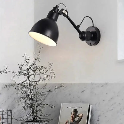 Minimalist yellow & black wall mounted lamp, black metal shade, warm light by Decorbites on Tampa Home & Garden Store