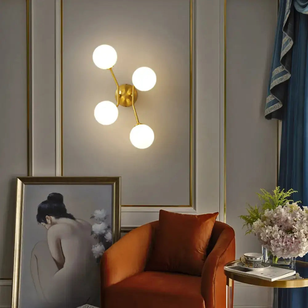Brass Branch Glass Sconce by Decorbites, gold wall light with four frosted glass globes on Tampa Home & Garden Store