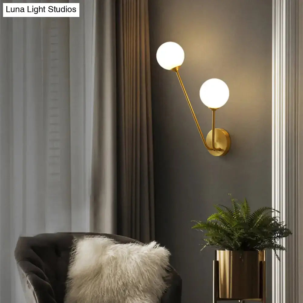 Brass Branch Glass Sconce by Decorbites, dual frosted-glass globes on gold stems, wall-mounted on Tampa Home & Garden Store