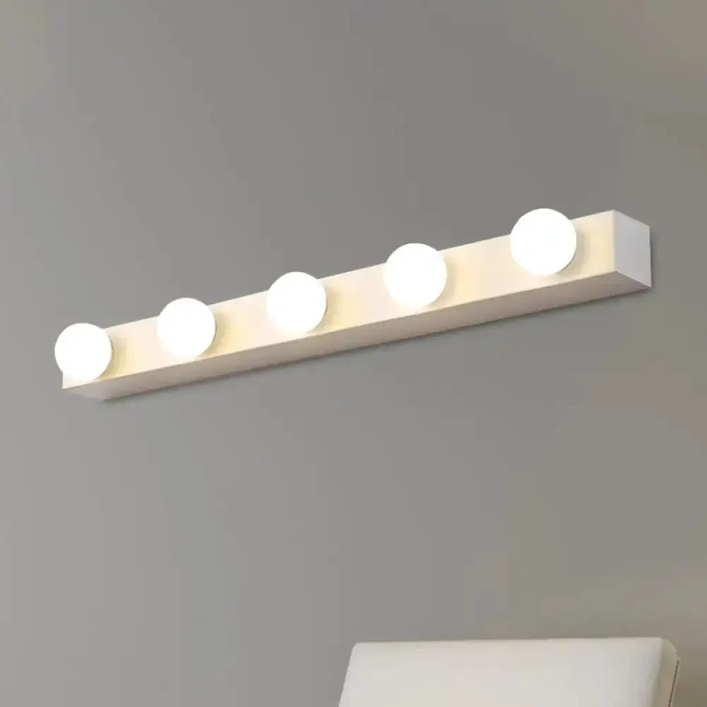 Decorbites minimal white four-light vanity fixture with open bulbs on a slim bar on Tampa Home & Garden Store