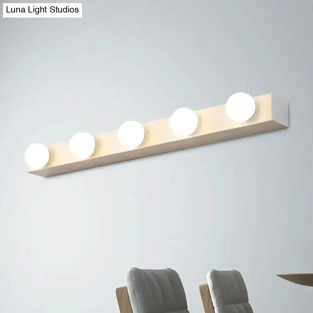 Minimalistic white 4-light vanity fixture with open bulbs for bathroom on Tampa Home & Garden Store