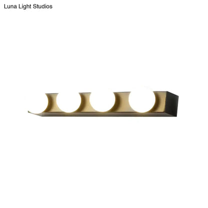 Minimalistic white four-light vanity fixture with exposed globe bulbs and brass bar on Tampa Home & Garden Store