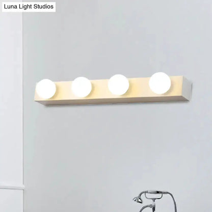 Minimalistic white four-light vanity fixture with open bulbs Decorbites on Tampa Home & Garden Store