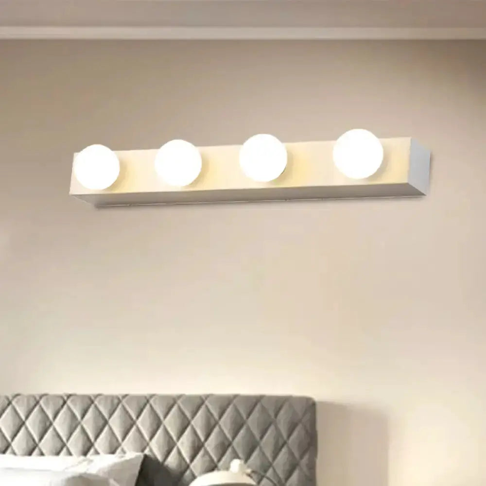 Wall-mounted minimalistic white 4-light vanity fixture with open bulbs Decorbites on Tampa Home & Garden Store
