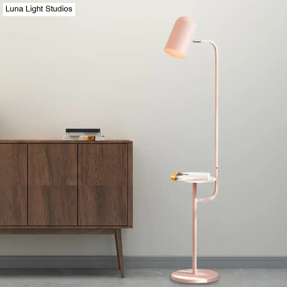 Mint Bell Metal Floor Lamp with pink finish and integrated side shelf beside a wood sideboard on Tampa Home & Garden Store
